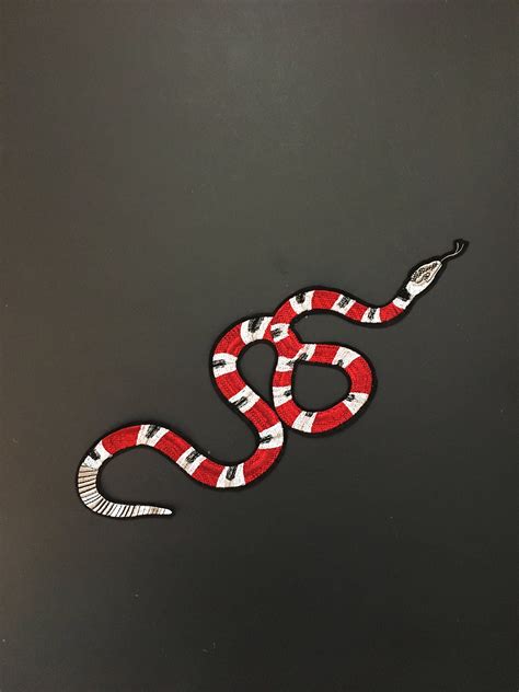 iron on gucci snake